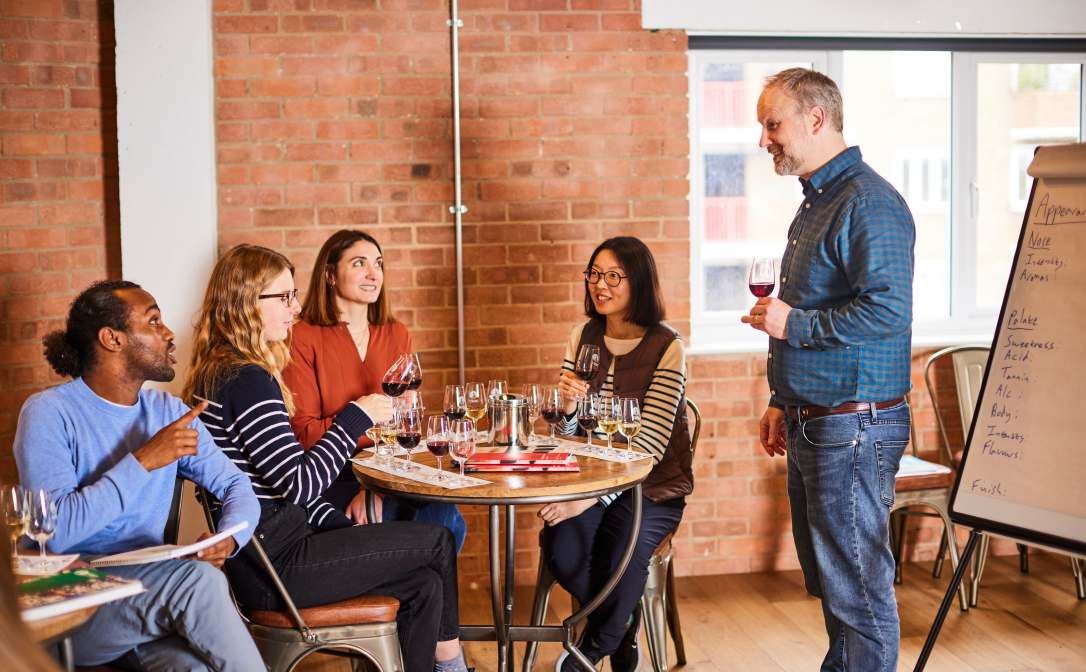 A WSET educator presenting a class