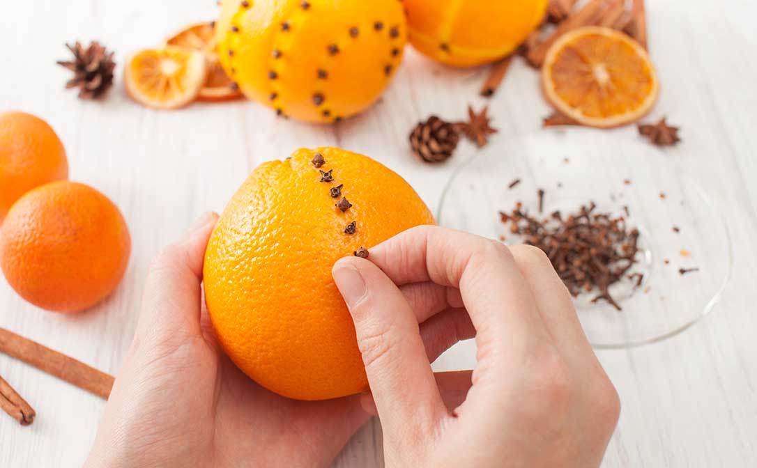 Fresh orange studded with cloves